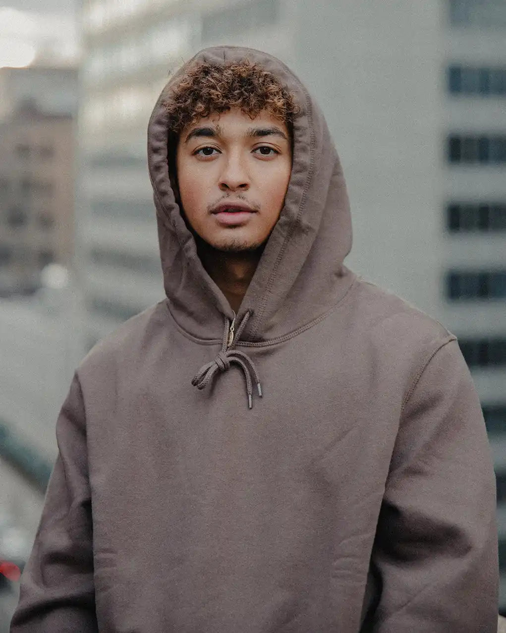 Brown hooded sweatshirt.